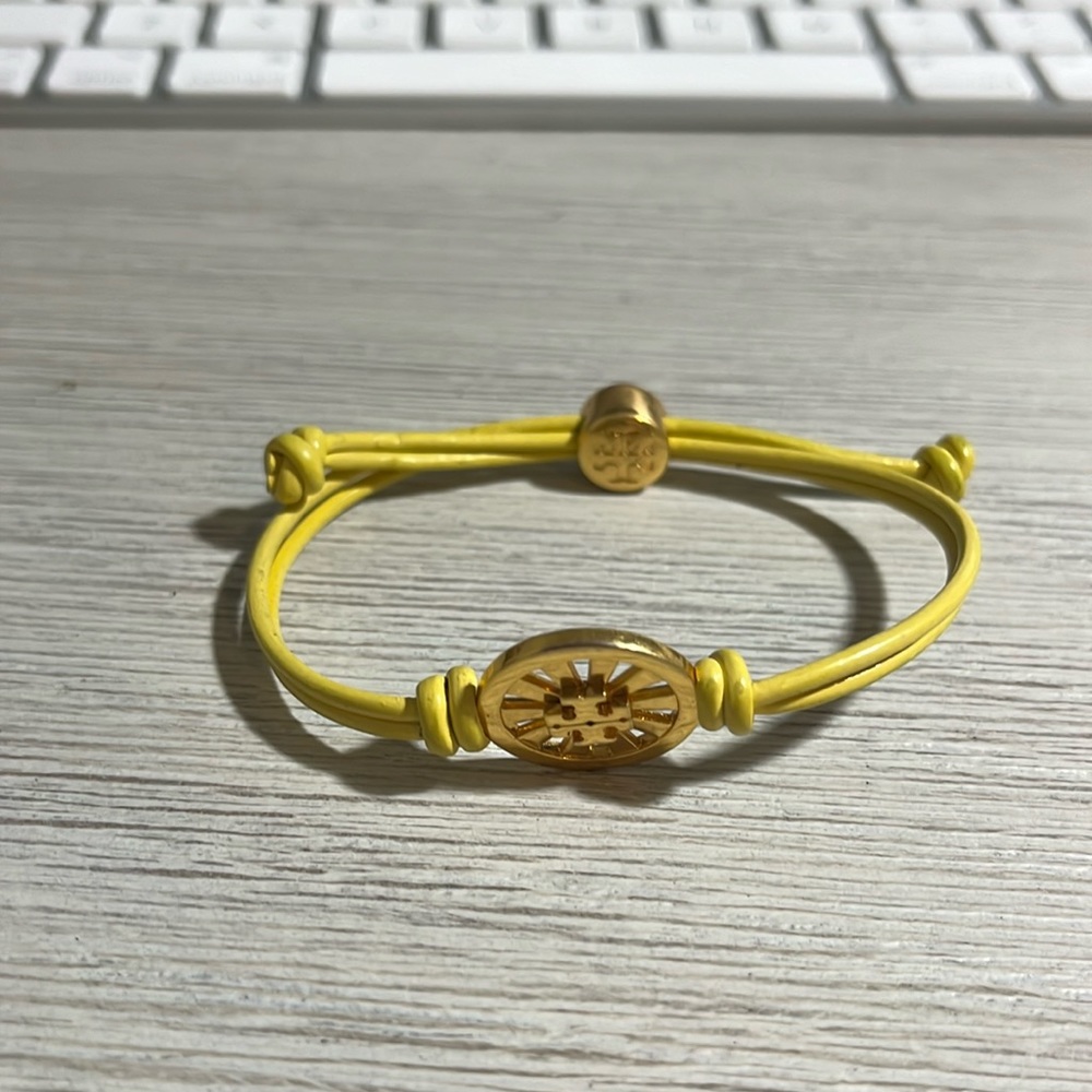 Tory Burch Yellow Gold and Leather bracelet